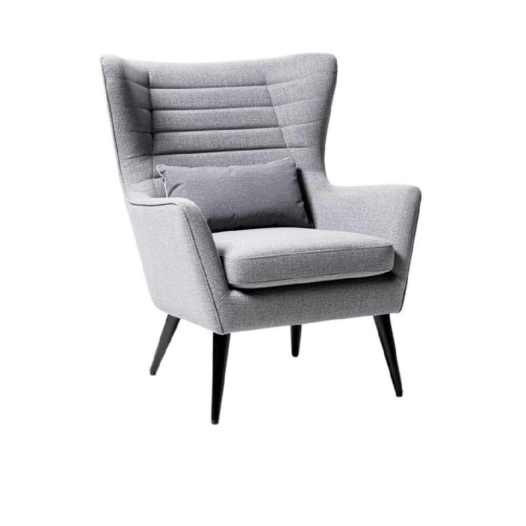 Fauteuil moderne en tissu gris avec coussin